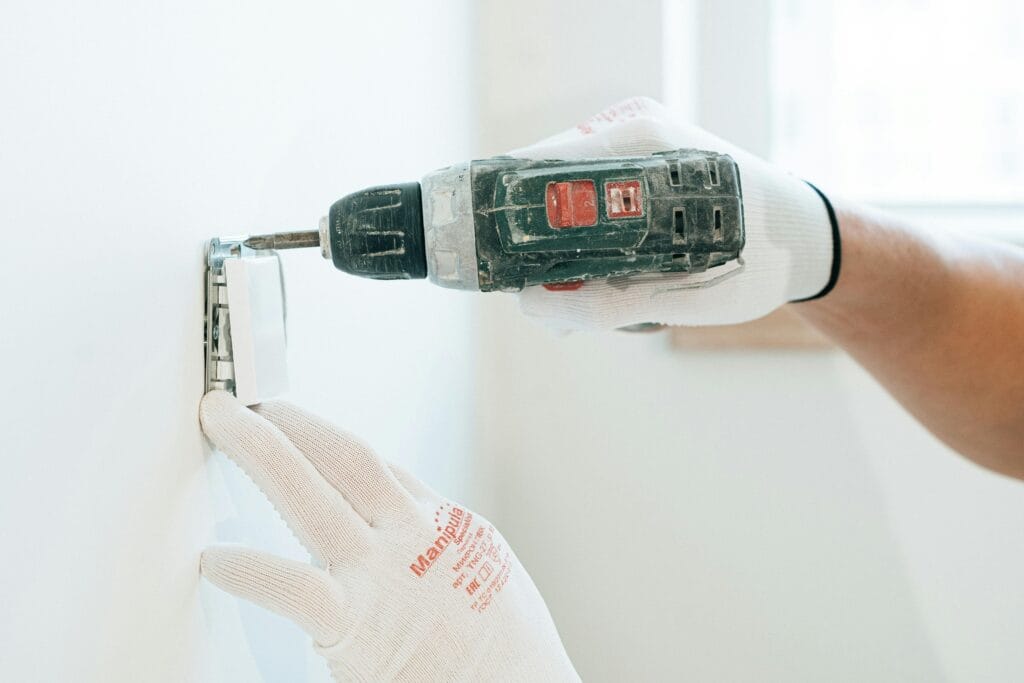 A Man using Power Tool